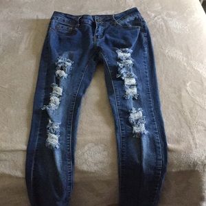 Blue distressed skinny jeans